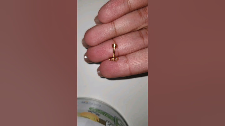 How to remove stuck gun piercing earings easily                #earpierced  #earpiercings