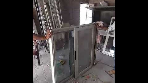Aluminium sliding domaal window two track and 3 track with mosquito net. 450rs.sq.Feet.
