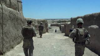 Patrol Walks through Streets of Delaram