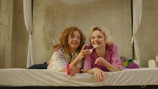 A Lesbian Couple Blowing Soap Bubbles | 4K Free Stock Video | Royalty Free Stock Footage