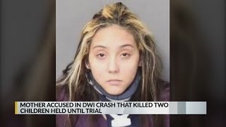 Mother accused in DWI crash that killed 2 children to stay behind bars until trial
