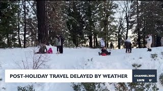 Post-Holiday travel delayed by weather