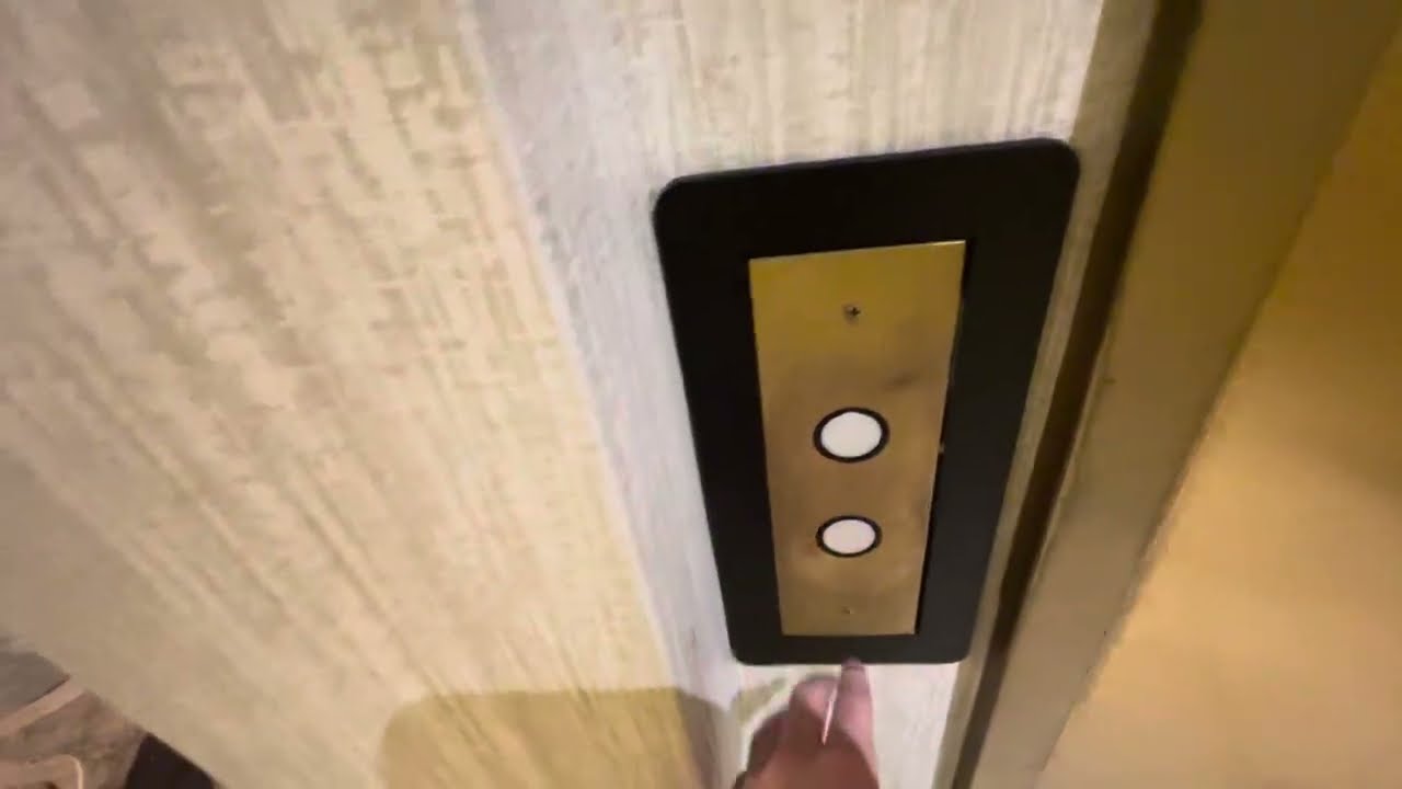 Busy Glass High Hydraulic Elevator at the Gaylord Opryland Resort Hotel in Nashville TN Night