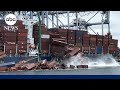 Operations suspended at California port after cargo containers tumble off ship