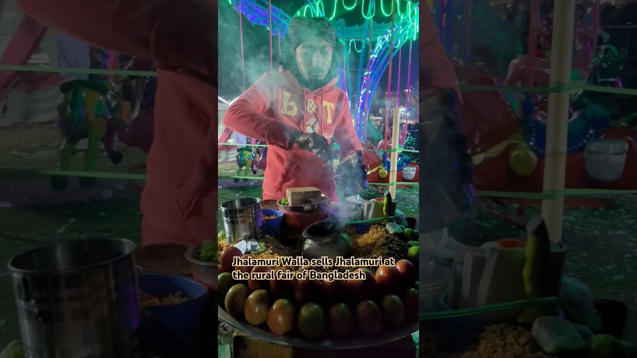 Jhalamuri Walla sells Jhalamuri at the rural fair of Bangladesh