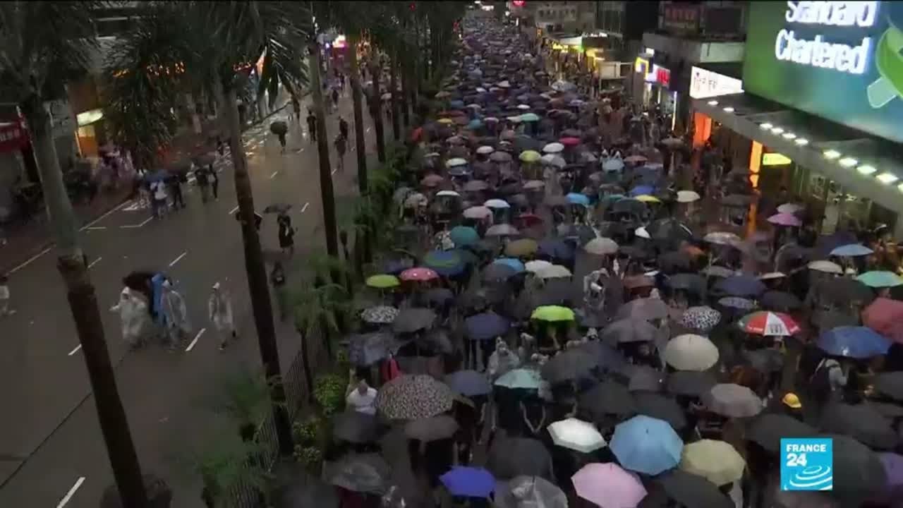 Protesters flood city despite rain in mass weekend protest