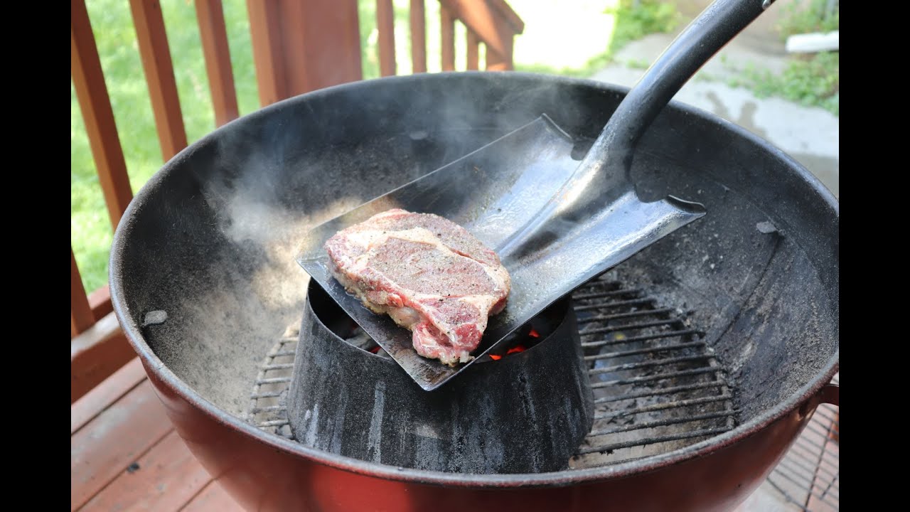 Ribeye steak seared on a shovel. How to cook a steak on a shovel with