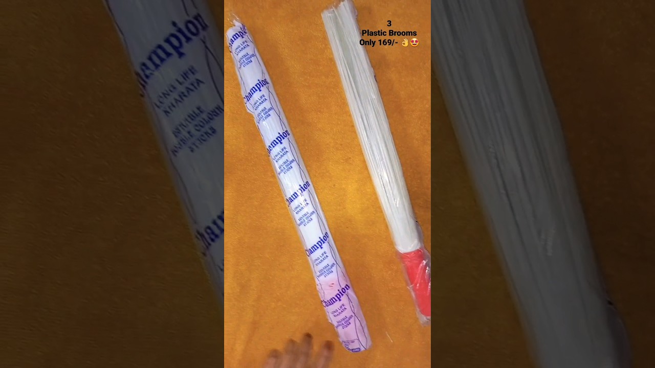 3 plastic Brooms 
