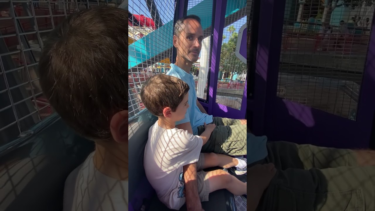 Riding the swinging car on the Ferris wheel at Pixar Pier 8-1-24