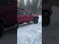 Xterra and mazda pickup offroad in wet snow