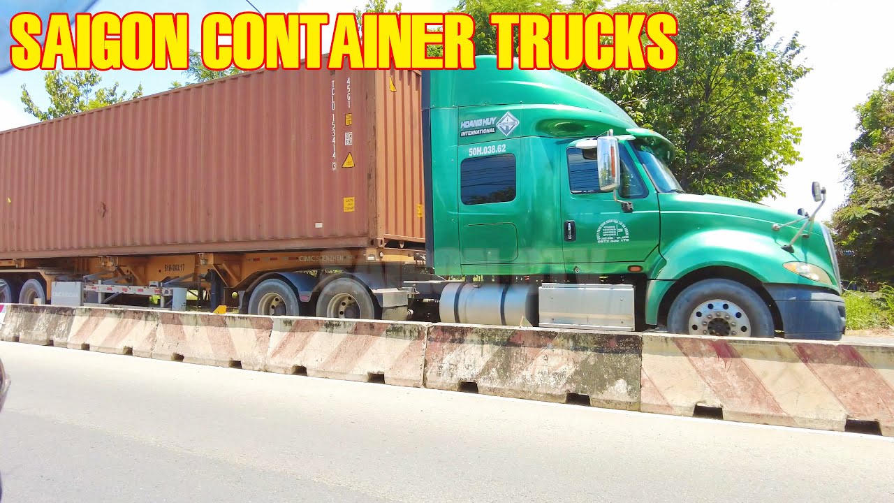 CONTAINER TRUCKS ON THE ROAD / CONTAINER TRUCKS PHU MY BRIDGE / SAIGON CONTAINER
