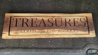 Treasures  Vcarve Sign  on black walnut  cutting out pocket border  shapeoko 3