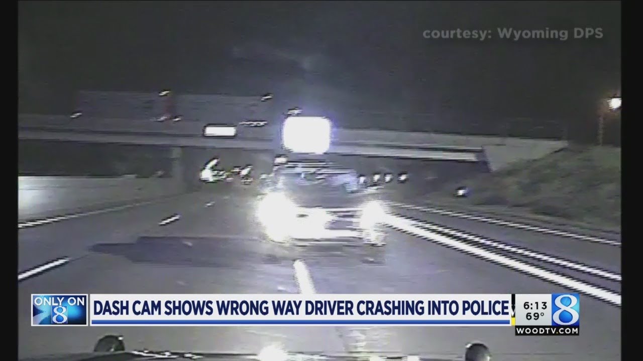 Dash cam shows wrong-way driver crash into cruiser - YouTube