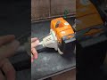 STIHL FS 120 COM O SUPORTW DO TUBO QUEBRADO E COM A LÂMINA FORA DE CENTRO.