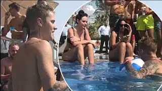 Justin Bieber spotted talking to fans in a pool in Dubai