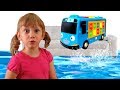 Alena and Pasha play with toy Minibus and save it from water
