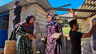 Repairing the roof of Fariba house by Ali Saleh