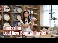 The new bone china set with falling green leaves is the best seller at the exhibition