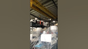 Injection molding machine factory loading process with crane lift plastic manufacture need