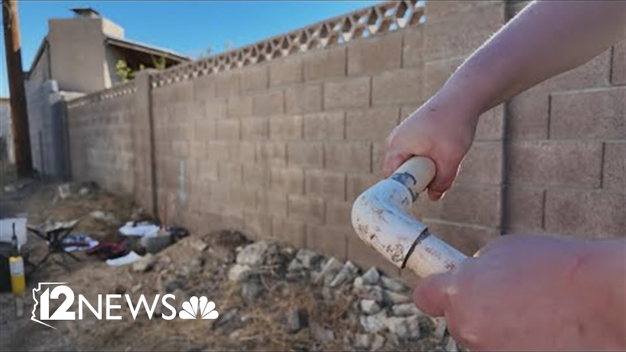 Couple fights Phoenix over water line repair