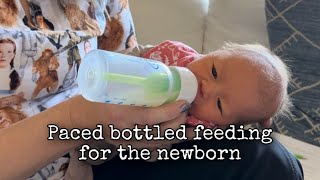 Paced bottle feeding for the newborn in side lying