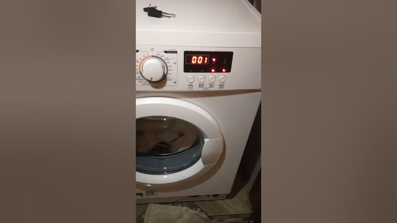 super general washing machine ending a wash to opening the door