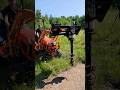 Earth Auger On A Kubota BX23S Kubota Earth Auger On A Kubota BX23S Kubota