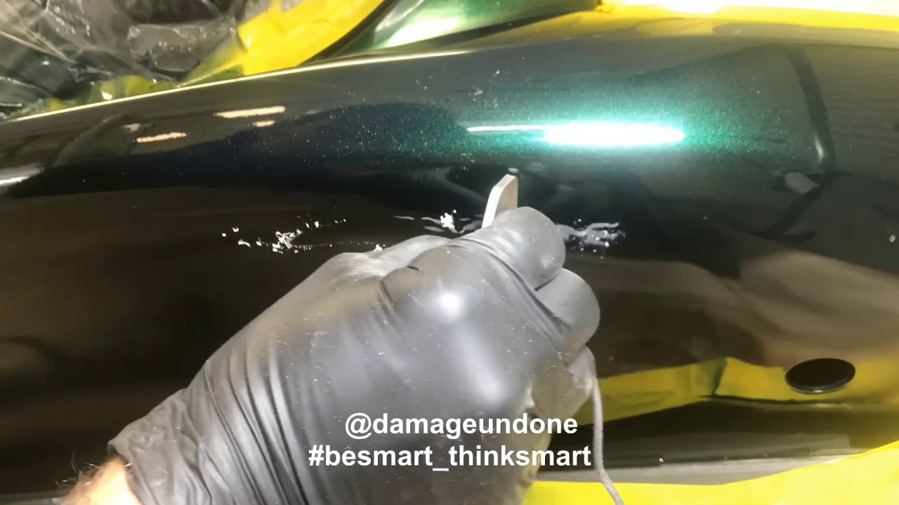 Removing a paint run with Mirka shark blade by Damage Undone
