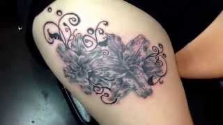 Tattoo video diary of tiger lily thigh tattoo by Jarris Vonzombie