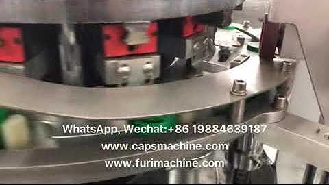 Flip top cap closing machine