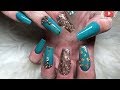 Teal and rose gold acrylic nails