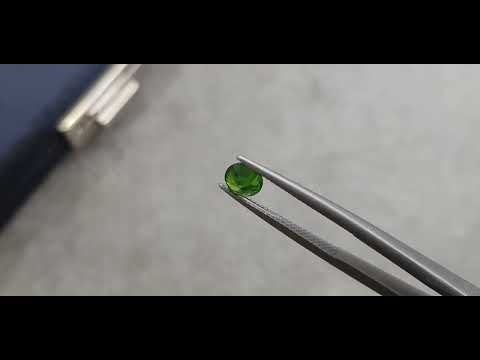 Russian demantoid with horse tail like inclusion 0.87 ct Video  № 1