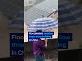 Watch floodwaters swallow an entire building in seconds | DW News