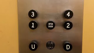 Historic Otis Black Button traction at the Hilt Building in Muskegon MI
