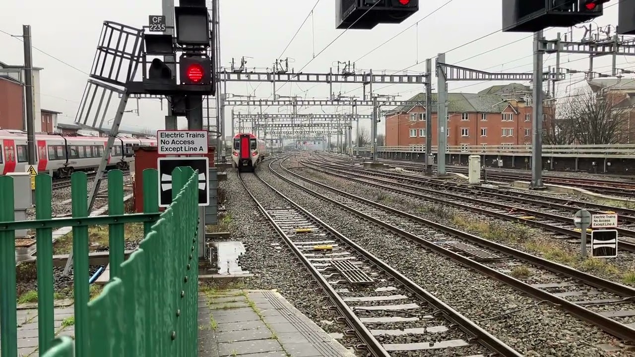 TFW 197048 8:18AM HOLYHEAD TO CARDIFF CENTRAL DEPARTING CARDIFF CENT PLAT3 TO CARDIFF CANTON SIDINGS