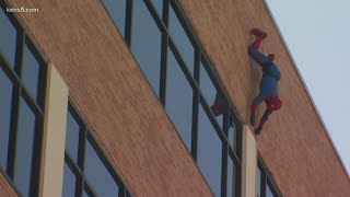 SWAT officers throw on superhero spandex, surprise children's hospital patients outside rooms