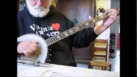 Banjo 5th string capo railroad spike installation