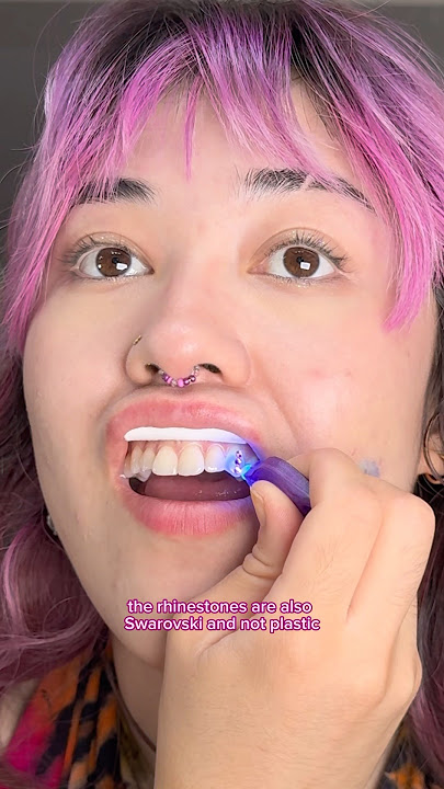I gave myself fangs with Swarovski tooth gems #diy #toothgems #gemzeez #swarovski #rhinestone #fangs