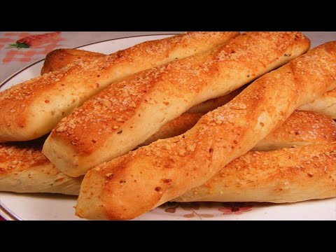 FRESH GARLIC PARMESAN BREAD STICKS.