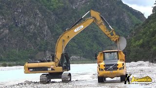 Caterpillar 336D Excavator Loading Dumpers Caterpillar 730C and Volvo A30G