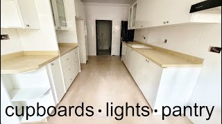 A Look Inside My New Kitchen Cupboards Pantry and Lights in Nigeria | Flo Chinyere