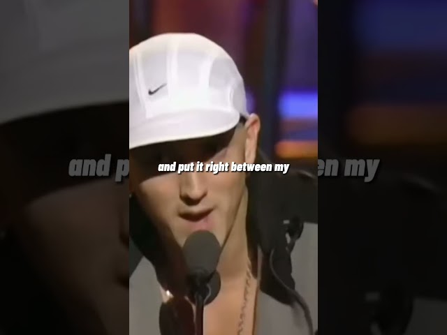 Eminem accepts an award from Britney Spears and Christina Aguilera😂 class=