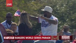 The Texas Rangers player's trucks come through the 2023 World Series championship parade