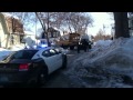 Bus stuck on sewer truck and snowbank in Methuen
