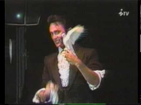 This is Lance Burton with nice ilusions with birds. Im not sure that this video is from fism but its awesome.