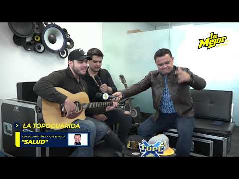Gonzalo Martínez y José Esparza en La Topoguarida diciendo "Salud"