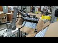 Schoeneck Containers Success Story - Sure Controls Omron Cobot Bottle Line Loading