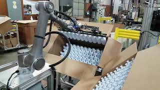 Schoeneck Containers Success Story - Sure Controls Omron Cobot Bottle Line Loading