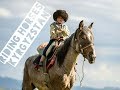 Hitch-Hikers Riding Horses to Lake Song Köl, Kyrgyzstan. by Madeleine Knight and Regimantas Danys