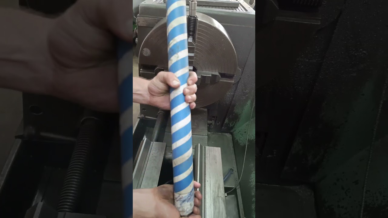 Shaft replacement on a small bulldozers track tensioner!! 